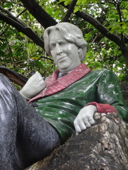 fuckyeahoscarwilde:  alexmuninn:  stephenfrycunninglinguist:  fuckyeahoscarwilde:  Oscar Wilde statue in Merrion Square, Dublin(a.k.a. The sassiest statue of them all.)  His facial expression though.  It gets better. IIRC, there’s a statue of a naked