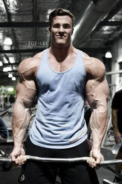 muscle-addicted:  Calum von Moger  He looks photo shopped. Those arms. Damn