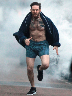  Tom running through the streets of London