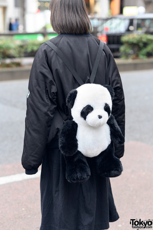 15-year-old Japanese student Nanase on the street in Harajuku wearing a panda themed style with a pa