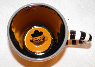 woodsmokeandpumpkins:  Halloween Mugs, from Ghoul Gallery 
