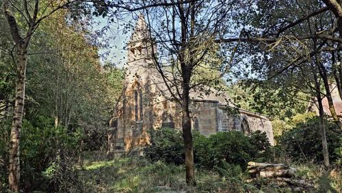 A North Yorkshire Moors Church.England.By chance I stopped my car to snap thetelephone box then spie