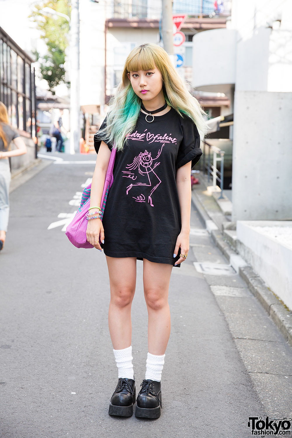 20-year-old Japanese fashion blogger Marina on the street in Harajuku with green ombre hair, an oversized Faline Tokyo t-shirt, platforms, and an American Apparel tote bag.