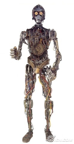 casfree:  So in episode one, R2 tells C3PO that he’s naked because his parts are showing. And when 3PO is complete, he has wires and things showing at his midriff. Conclusion: C3PO wears a crop top. 