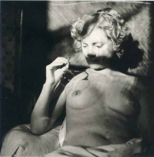 flashofgod:  Man Ray, Portrait II of Lee Miller with Bubble Pipe, 1932.