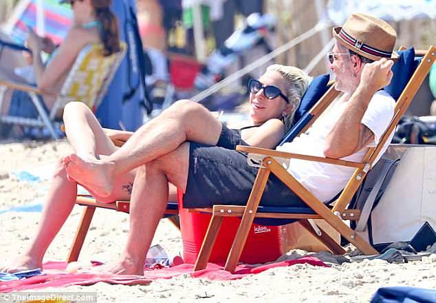 gagamedia:  July 1: Lady Gaga and Christian Carino at the beach in The Hamptons.