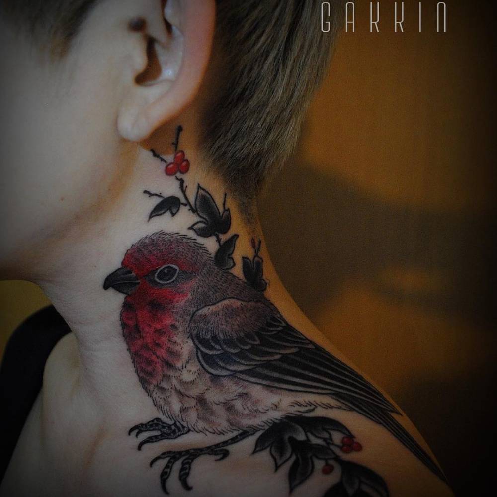 tattoofilter:  Red-headed finch tattoo on the left side of the neck. Tattoo artist: