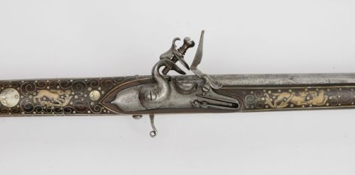 A rare bone and pearl decorated flintlock axe pistol originating from Silesia, circa 1670.