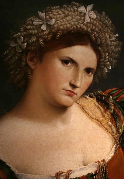  Lorenzo Lotto - The Portrait of a Woman with a Drawing of Lucretia. Detail. 1530 - 1533 