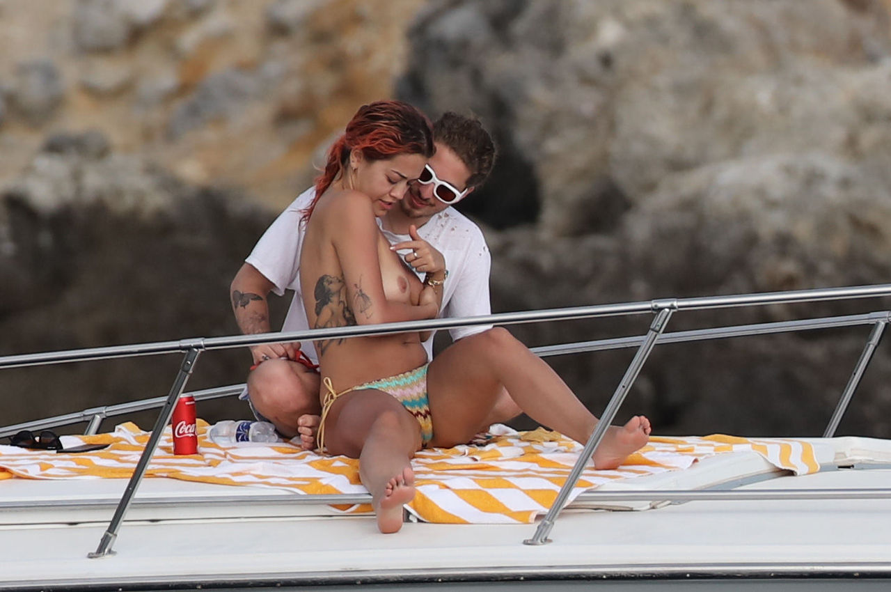 celebpaparazzi:  Rita Ora topless on vacationAccess ALL of Rita’s NUDE scenes &amp;