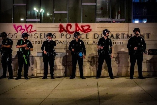 &lsquo;1312 ACAB&rsquo; tagged on the LAPD HQ during a protest in solidarity with the revolt in Minn