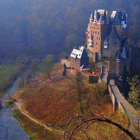 Burg Eltz is a medieval castle nestled in the hills above the Moselle River between Koblenz and Trie