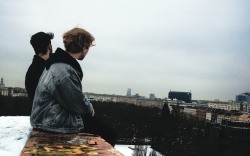 coltre:on a freezing cold day, me and my friend climbed on the top of an abandoned factory and saw Berlin smiling in front of us 