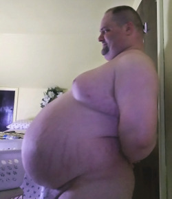 bigblackirish:My beautiful bellyboy.  That big gut is gonna take a lot of punches.