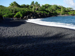odditiesoflife:  Punalu’u Black Sand Beach and Turtle Refuge, Hawaii The black sand in Punalu’u Black Sand Beach on the Big Island of Hawaii is made of basalt and created by lava flowing into the ocean which explodes as it reaches the ocean and cools.