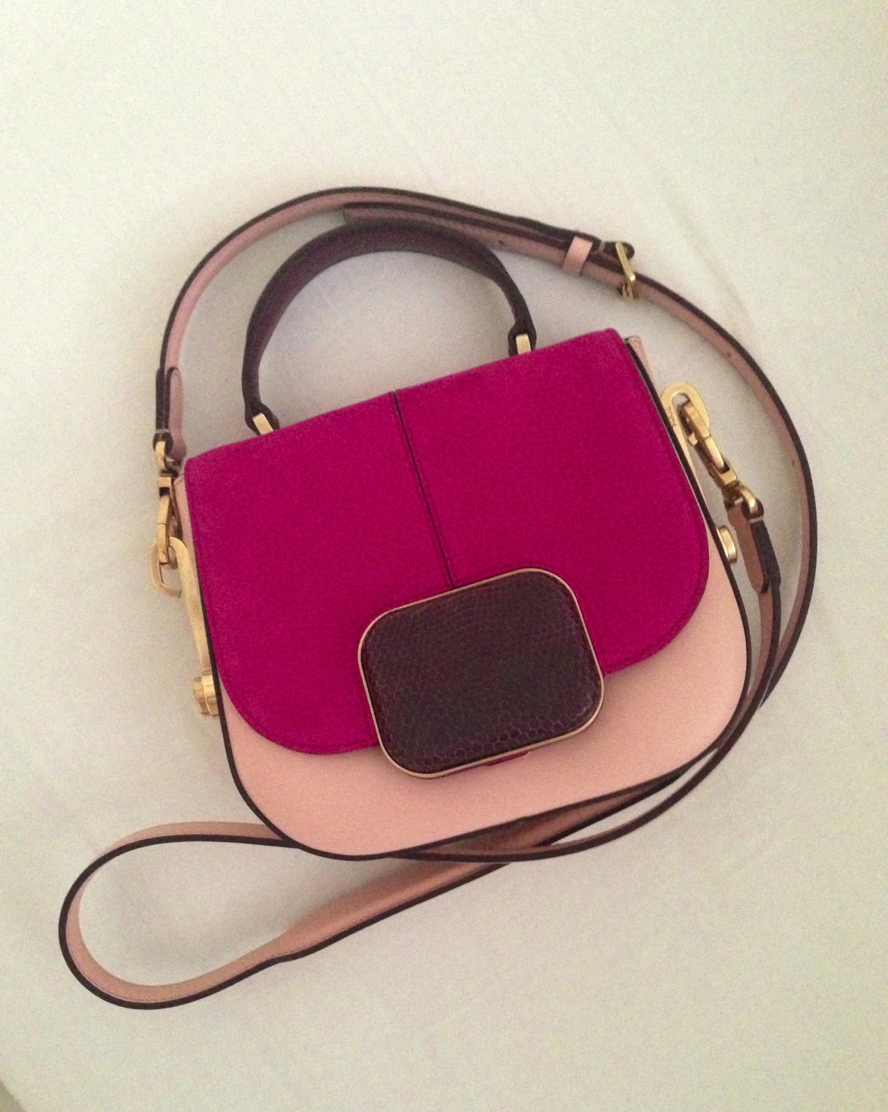 My bag of choice for AW13 - by Tods. Brilliant combo of pinks with a ...