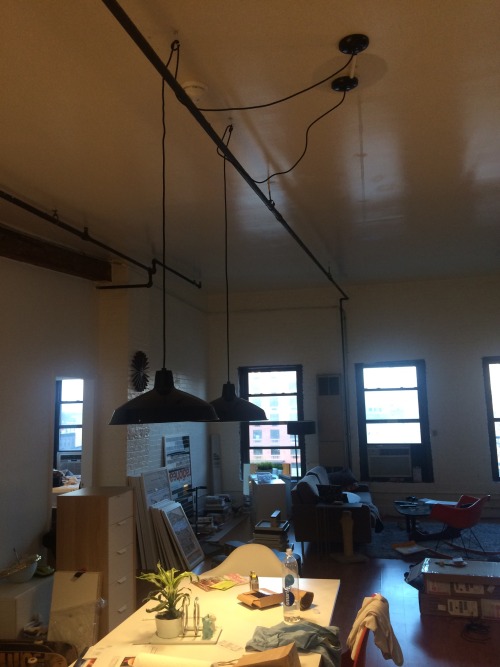 Got rid of the last remaining boob lamps and hung double pendants over the table.