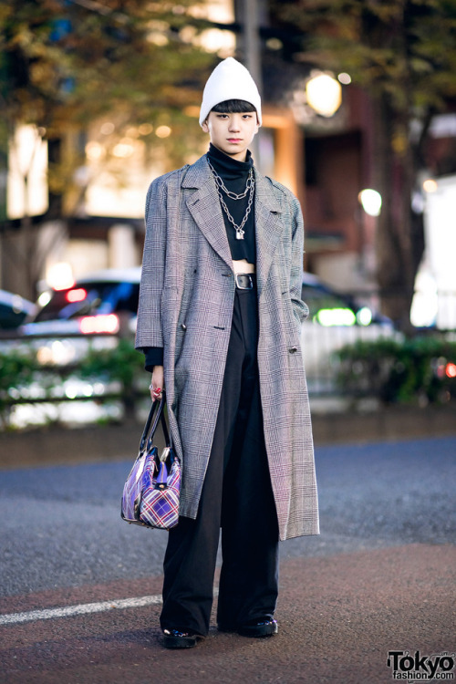 17-year-old Japanese student Billimayu on the street in Harajuku wearing a long vintage coat over a 