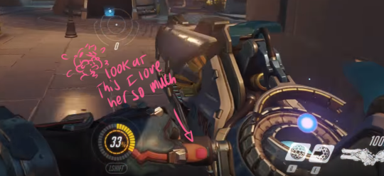 Also FYI, Zarya has on some pretty pink nail polish as she obliterates people with her massive muscles and energy cannon she ripped of a vehicle with said massive muscles good day