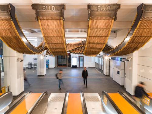 itscolossal: 80-Year-Old Wooden Escalators are Repurposed as a Sculptural Ribbon by Artist Chris Fox