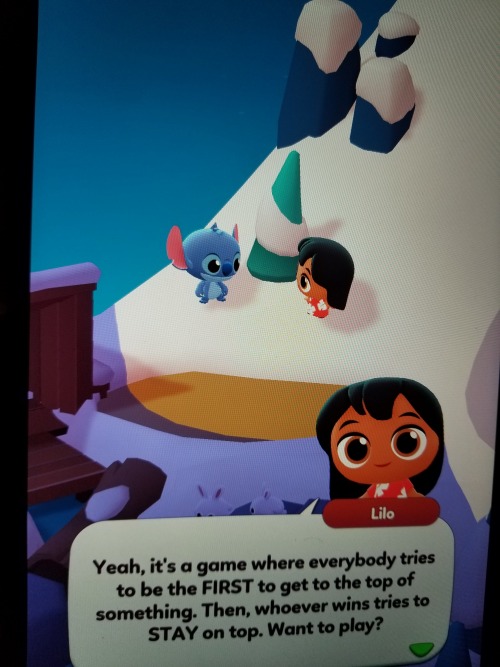 Lilo and Stitch playing King of the Hill on the snowy mountain scene from ‘Disney Getaway’More under