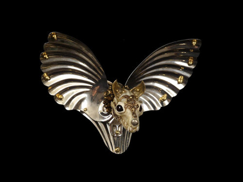 cross-connect:  Jessica Joslin transforms unexpected found objects such as bullet casings, old brass buttons, musical instrument parts, bones, and other nostalgic ephemera into skeletal animal figurines ranging in size from one inch to six feet. Her