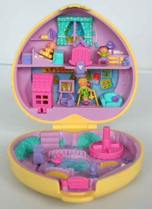 dirtyberd:  OMG this made me feel so weird inside. Pogs?!? And I def had that exact Polly Pocket 