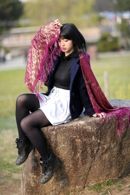 Black top, white skirt & black tights