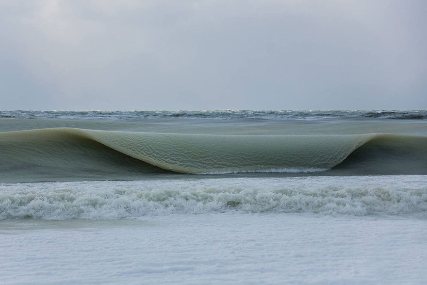 sixpenceee:Freezing Ocean Waves In Nantucket Are Rolling In As Slush  It’s so