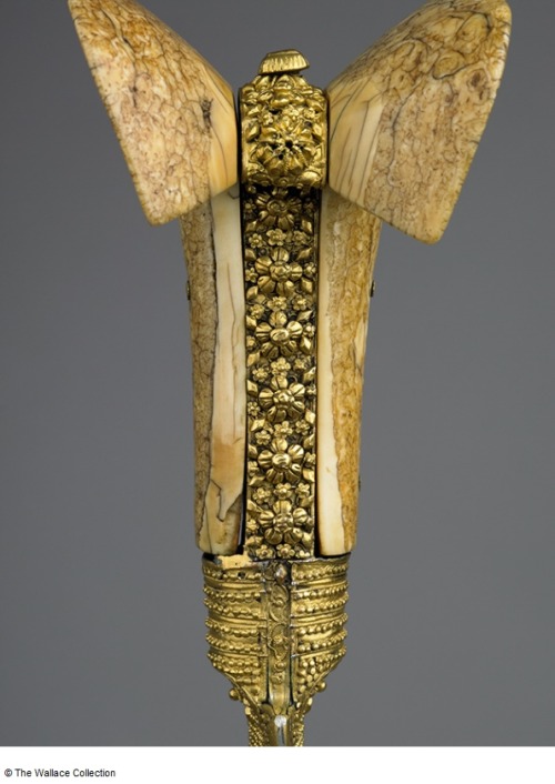 Silver and gold decorated Turkish yatagan with walrus ivory hilt, circa 1820.from The Wallace Collec
