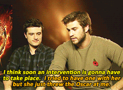 thatfunnyblog:  Josh Hutcherson and Liam Hemsworth on Jennifer Lawrence after winning