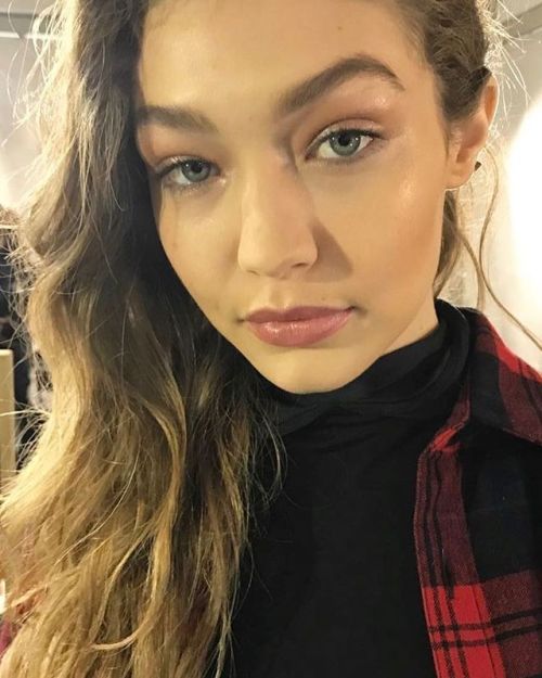 Gigi Hadid backstage at Max Mara FW17 RTW fashion show during MFW, February 23, 2017.