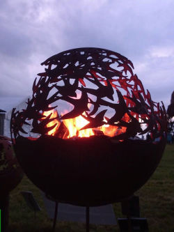 asylum-art:  iBeautiful Metal Firepits Of Art by The Firepit Company  The Wilderness Ball This Firepit features a wilderness scene. Including Stag, Doe and Fawn, Wolf, Moose, Swan and a flock of Geese flying accross the skyline.