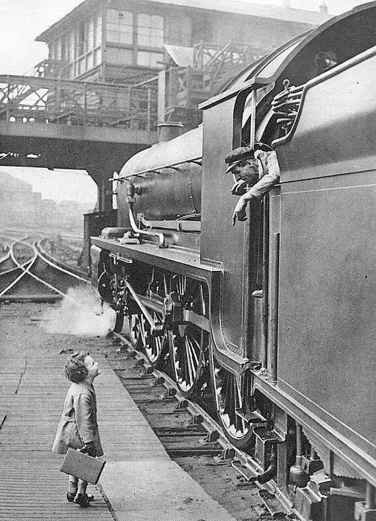 Southern Railway’s advertising: Little boy talking to the locomotive crew, Waterloo Station, 1924