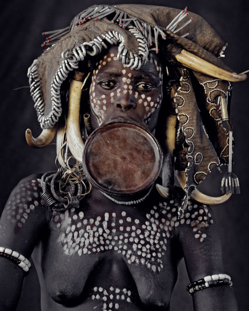 house-of-gnar:  Mursi tribe|Great Rift Valley “The nomadic Mursi tribe lives in the lower area of Africa’s Great Rift Valley. Extreme drought has made it difficult to feed themselves by means of traditional cultivation and herding. The establishment