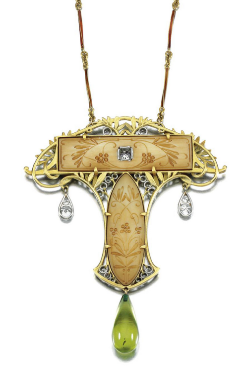 thirtyknives:  Pendant by Pierre-Georges DeRaisme. Circa 1900s. Gold, ivory, periodot, enamel, diamond. PIERRE-GEORGES DERAISME, 1900s The Art Nouveau pendant of open work foliate design decorated with green and brown enamel, framing two carved ivory