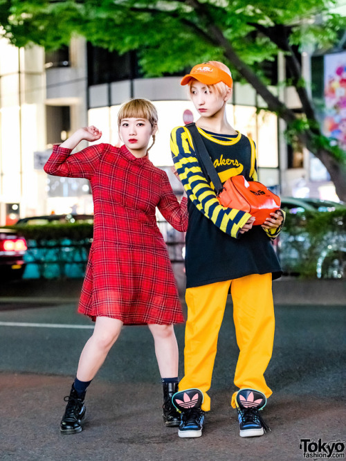 tokyo-fashion:  Always fun Karin and P-Chan from the Japanese dance group Tempura Kidz on the street in Harajuku at night wearing colorful looks with items from FUBU x Versace (Freak City), Lakers, Dr. Martens, Adidas, and SAS. Full Looks