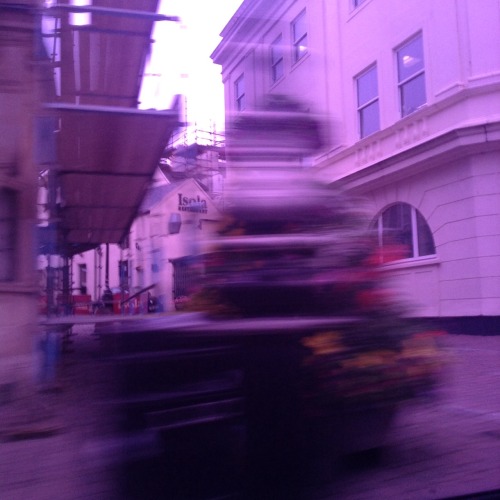 cluts:  a taxi with purple windows