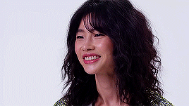 She Can't Help But Hum The Tune As She Repositions Herself, Shaking Off The Laughter And Putting On Her