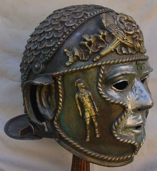 the-history-of-fighting:Roman face helmets