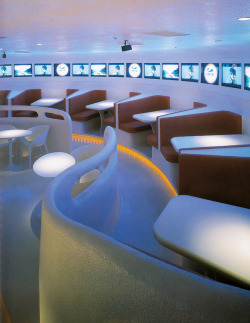 y2kaestheticinstitute:  J-POP Cafe Odaiba - FANTASTIC DESIGN WORKS (Katsunori Suzuki) (2002) “Restaurant situated in Sega’s Tokyo Joypolis, this cafe features a futuristic, organic design composed of solid plaster &amp; plastic. The chairs, tables,