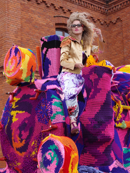  Yarn bomber Olek takes on her biggest project yet, a 4-car locomotive train covered in technicolor camo thread in Lodz, Poland! 