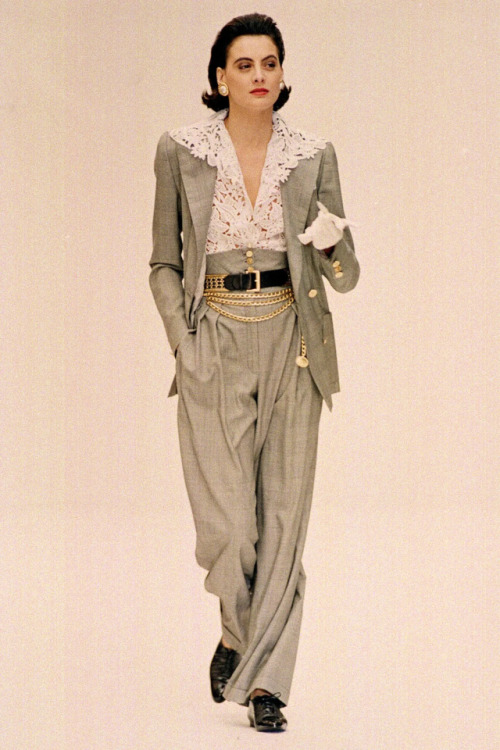 Model Yasmin Le Bon wears a Chanel suit. - Chic in Silk — Above