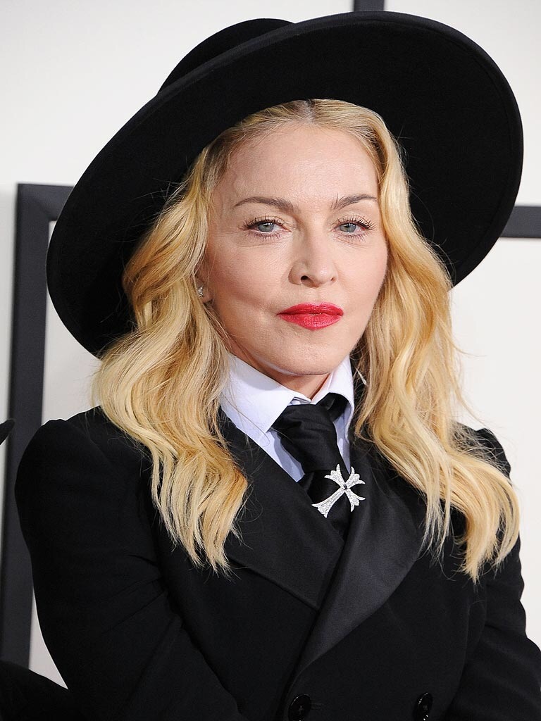 gayneyspears:  madonna before and after performing a reverse kiss of life on fallen