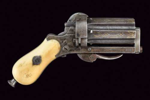 peashooter85:An ivory handled pinfire pepperbox revolver, mid 19th century.