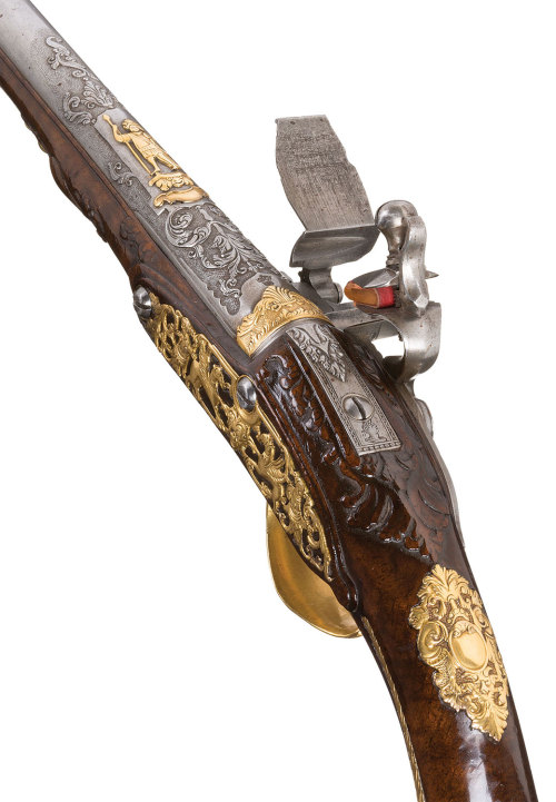 Extraordinarily decorated flintlock pistol crafted by the Dutch gunmakers Girard and Gerrit Penterma