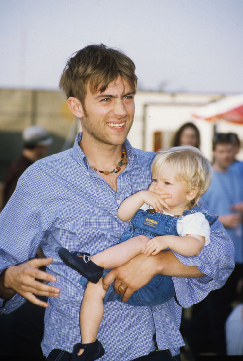 damonalbarn: Damon with his niece Lola at Glastonbury, 1996.