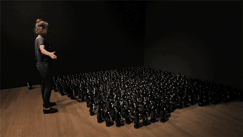 An Interactive Mirror Built From 450 Rotating Penguins By Daniel Rozin