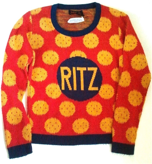 cruftlabs:thegroovyarchives:1971 “Orphan Annie” brand Ritz Crackers sweater(via: brinkdwellers on Et