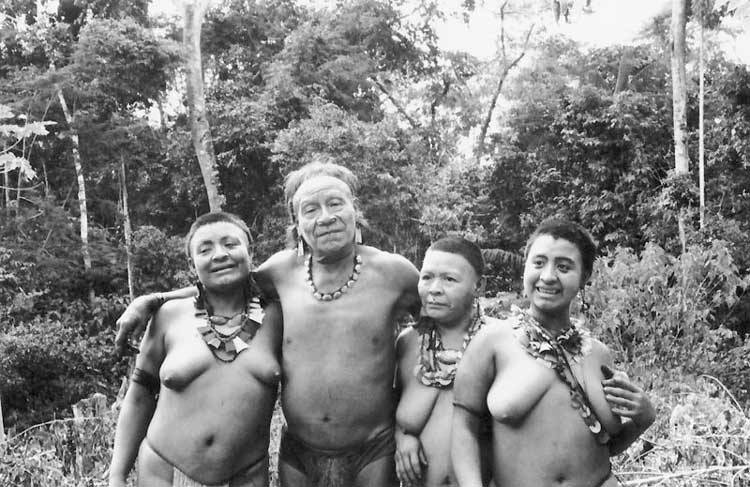   Kunibu and his family in the Akuntsu village. Photo: Adelino de Lucena Mendes,